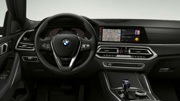 BMW X6, jossa BMW Business xLine, ohjaamo. BMW X6, sisätila, jossa BMW Business xLine, kuva ohjaamosta.