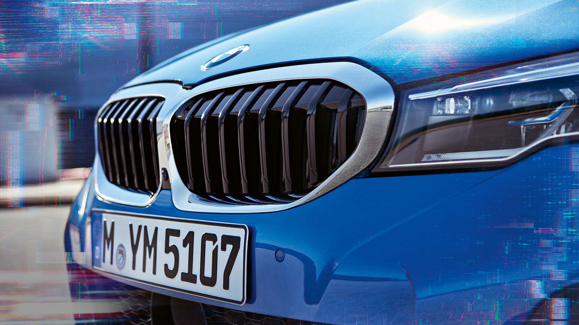 BMW 3-sarjan Sedan, jäähdyttimen säleikkö. Sivulähikuva BMW 3-sarjan Sedanin jäähdyttimen säleiköstä.