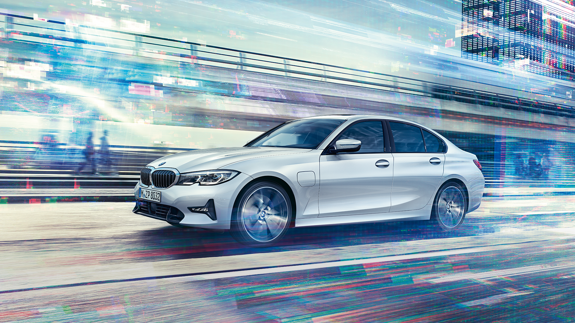 BMW 3-sarjan Sedan, sivukuva liikkuvasta BMW 3-sarjan Sedanin mallista 330e. Sivukuva liikkuvasta BMW 3-sarjan Sedanin mallista 330e suurkaupunkiympäristössä.