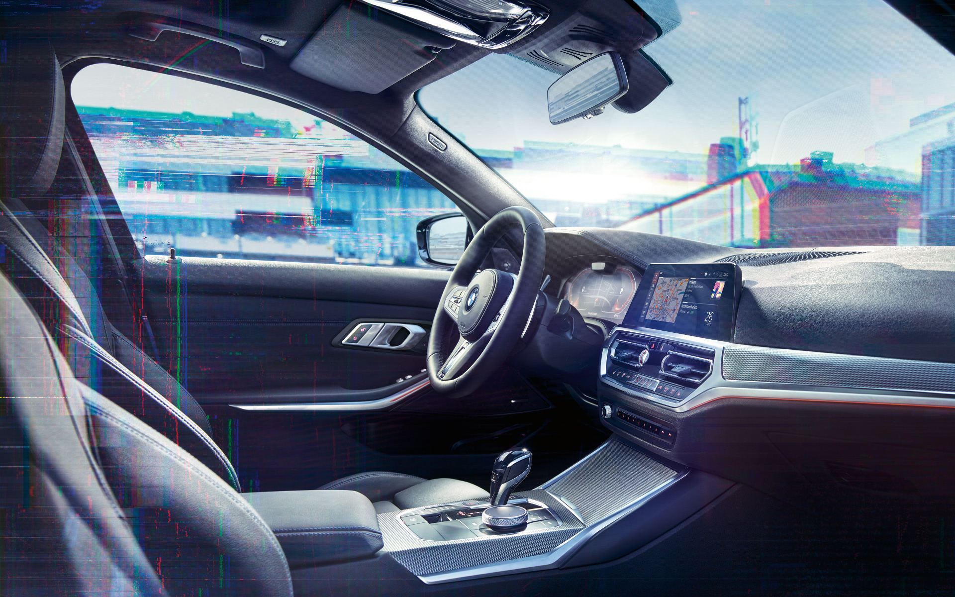 BMW 3-sarjan Sedan (G20), BMW Live Cockpit Professional. Lähikuva BMW 3-sarjan Sedanin (G20) sisätilasta, jossa BMW Live Cockpit Professional.