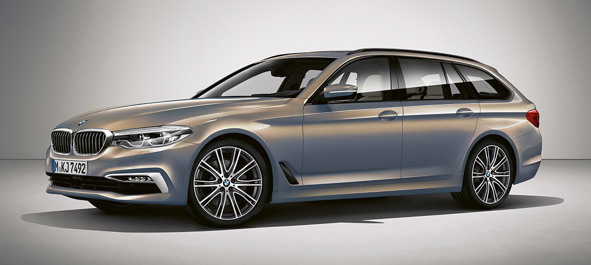 BMW Individual, BMW 5-sarjan Touring BMW Individual BMW 5-sarjan Touring G31 metalliväri Champagne Quarz, kolmen neljäsosan näkymä sivulta
