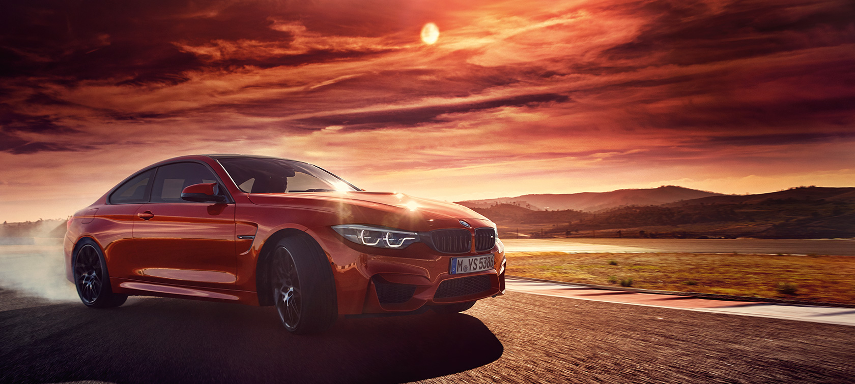 BMW M4 Coupé BMW M4 Coupé, sivunäkymä kaarteessa