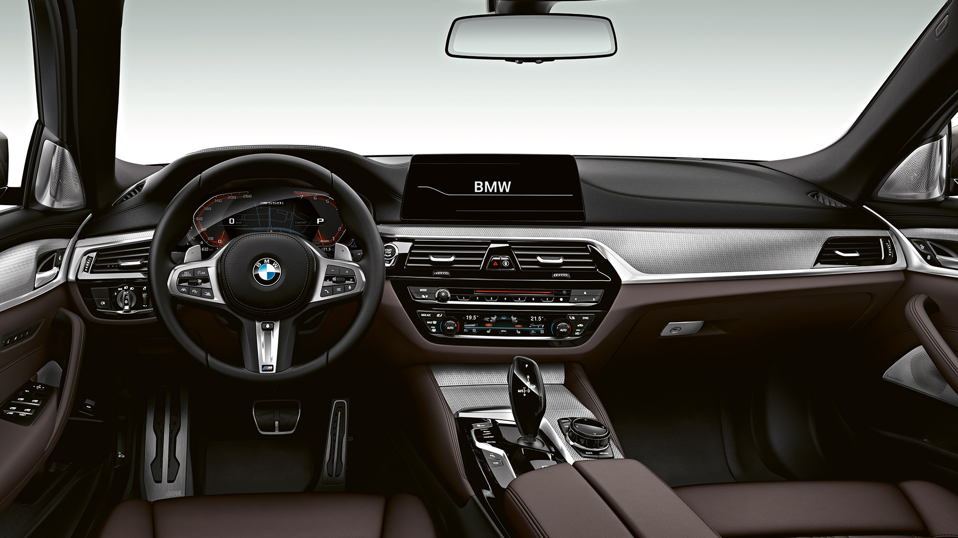Sisätilan muotoilu. BMW M550i ja BMW M550d, ohjaamo.