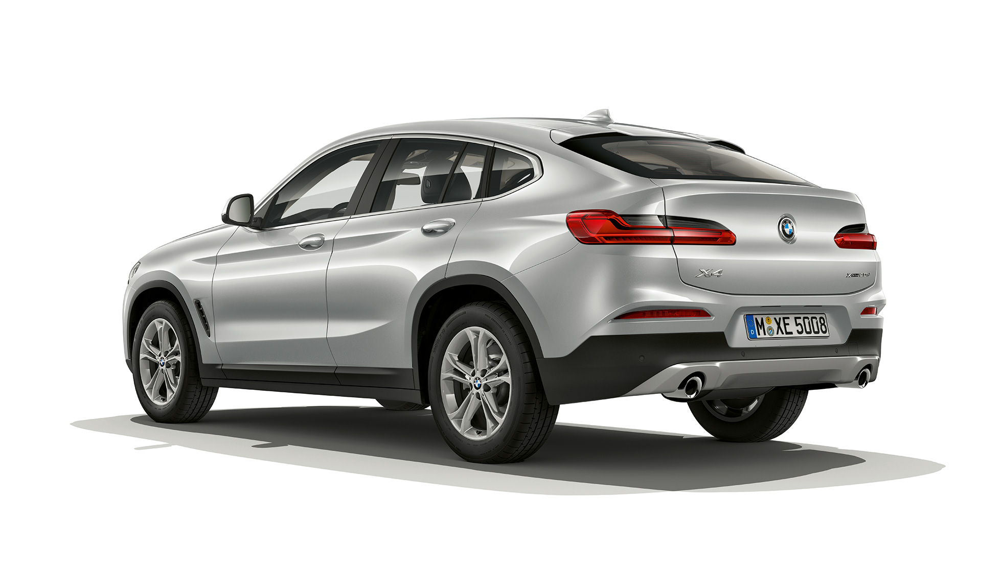 Kolmen neljäsosan näkymä takaosasta, BMW X4 Business-varustelu BMW X4 xDrive20d Business-varustelu G02 2018 Glacier Silver, kolmen neljäsosan näkymä takaosasta